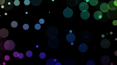 Abstract Colorful Bokeh Particles Floating On Black Background