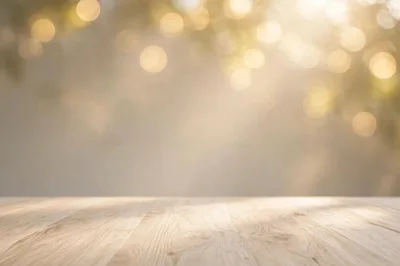 Empty Wooden Table Surface With Blurred Golden Bokeh Background