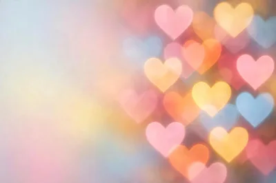 Abstract Background With Glowing Pastel Heart Bokeh