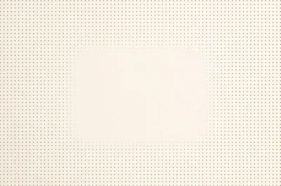 Beige Dotted Grid Paper Background With Central Blank Space