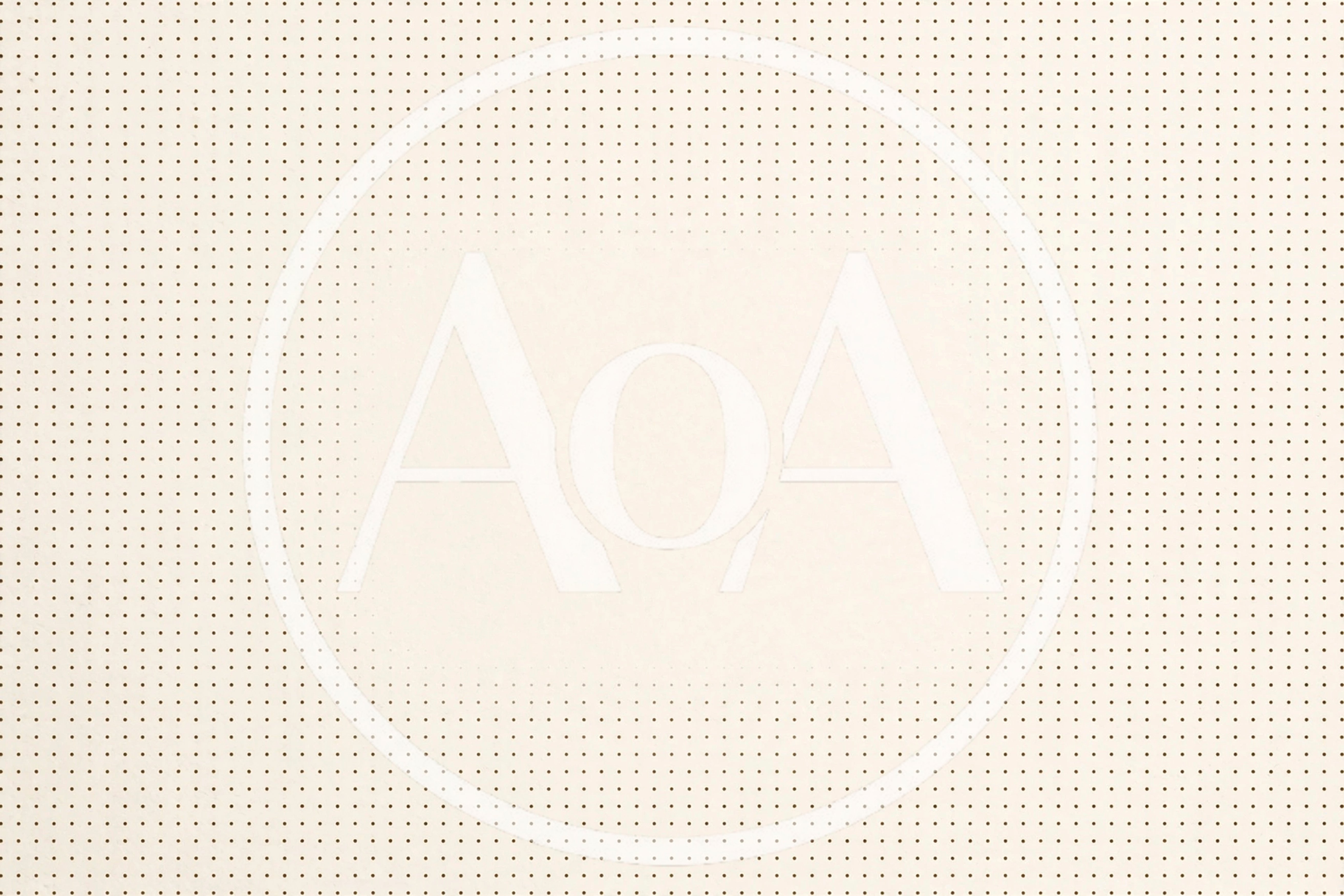 Beige Dotted Grid Paper Background With Central Blank Space