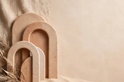 Minimalist Beige Arch Sculptures With Dried Botanical Decor