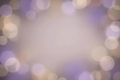 Abstract Purple And Gold Bokeh Light Background