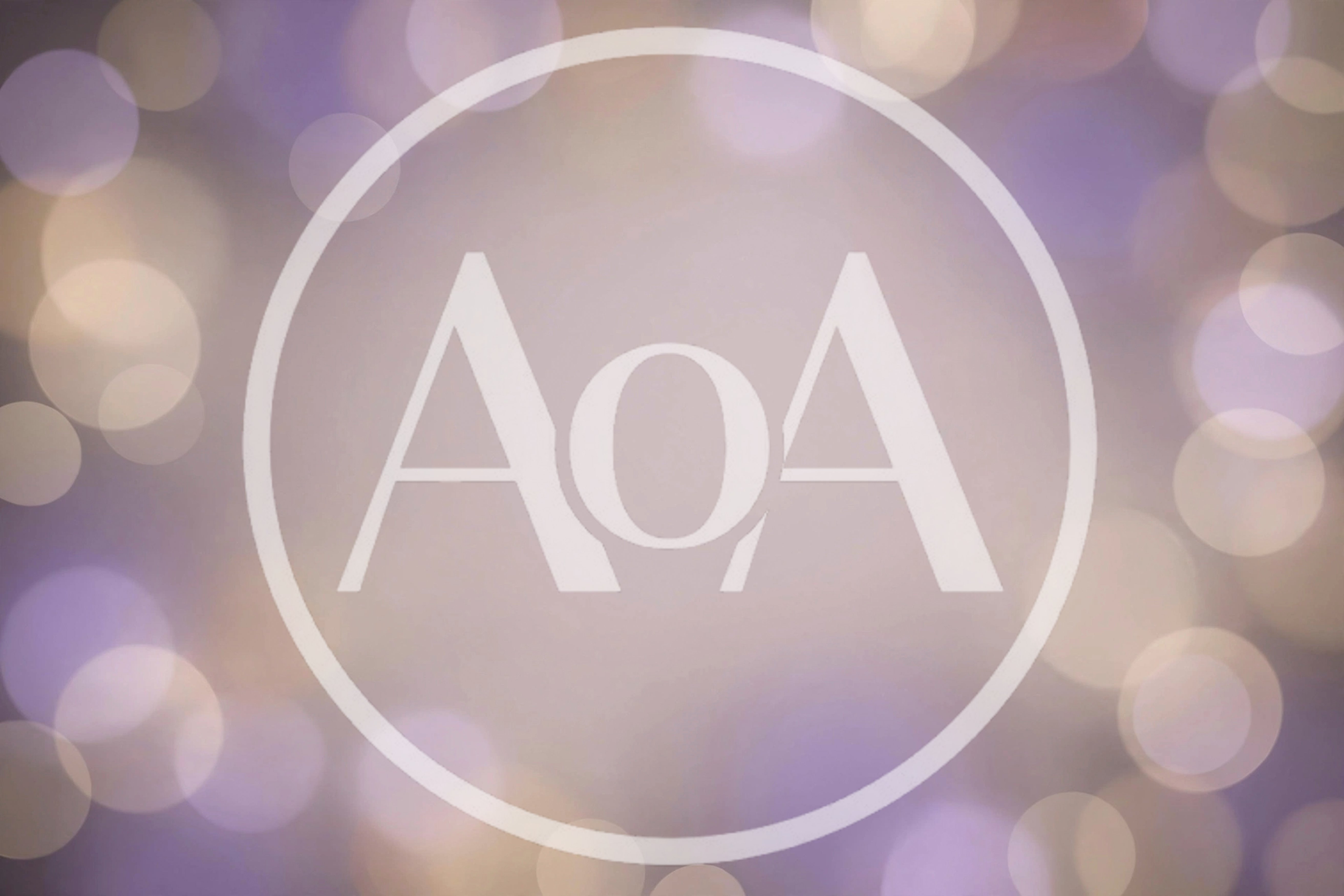 Abstract Purple And Gold Bokeh Light Background