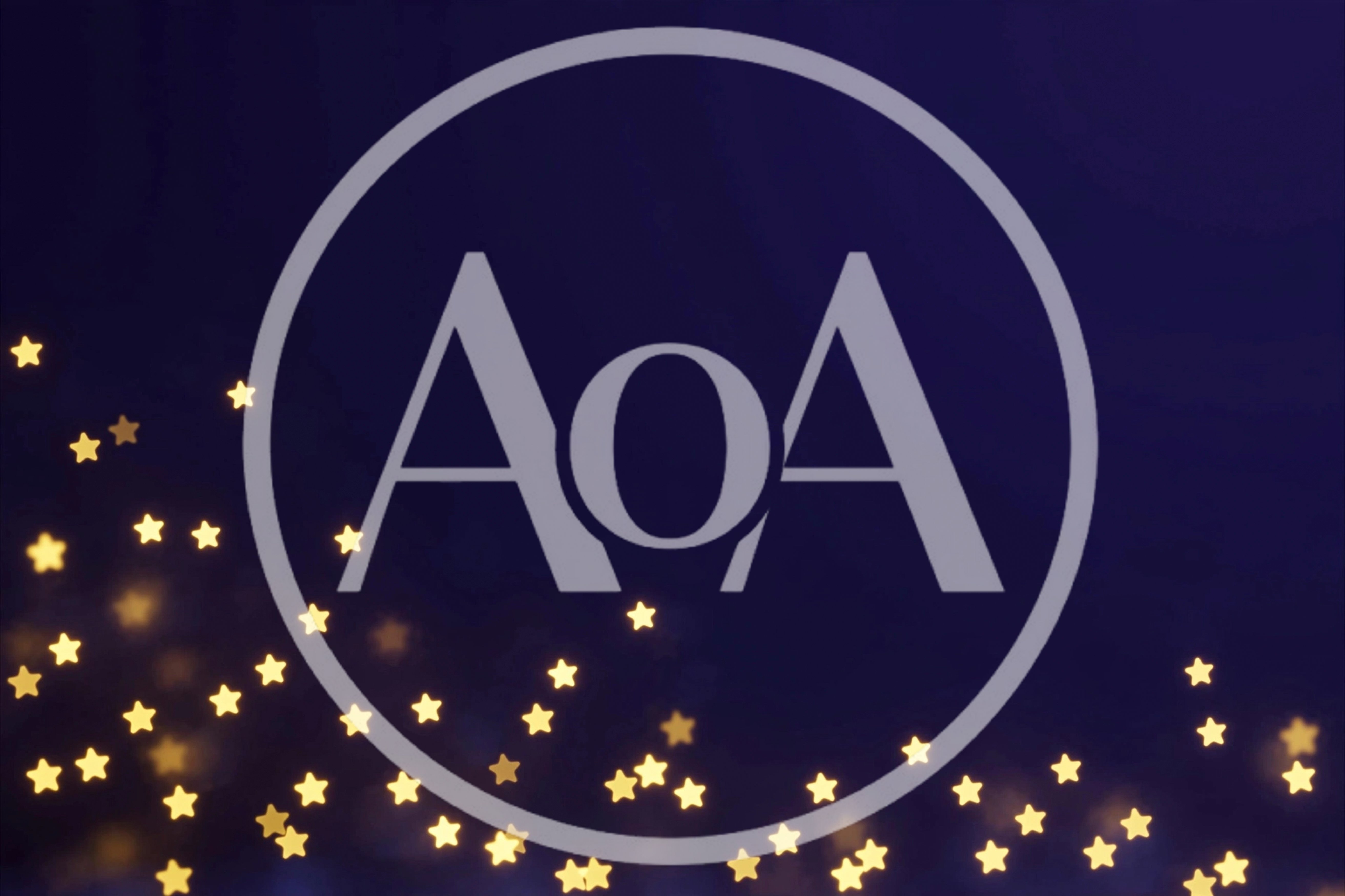 Star Shaped Bokeh Lights On Dark Blue Background