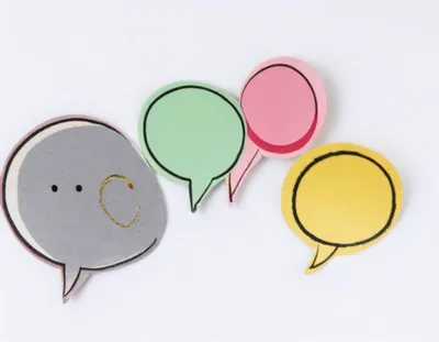 Colorful Paper Speech Bubbles On White Background