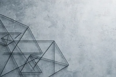 Abstract Geometric Metal Wire Art On Concrete Wall