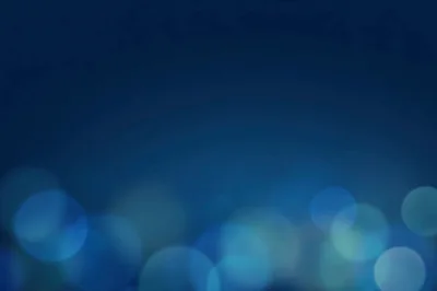 Abstract Blue Bokeh Background With Soft Light Orbs