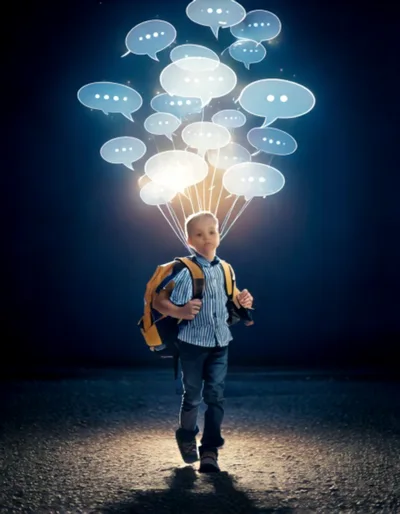 Young Boy Walking With Floating Speech Bubble Balloons