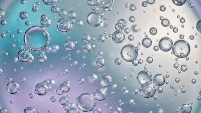 Floating Transparent Bubbles Rising in Liquid