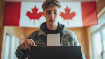 Young Man Casting A Ballot In Canadian Election