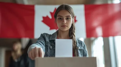 Young Woman Casting A Vote In Canadian Election