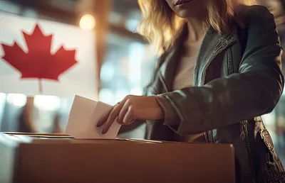Woman Casting A Ballot In A Canadian Election