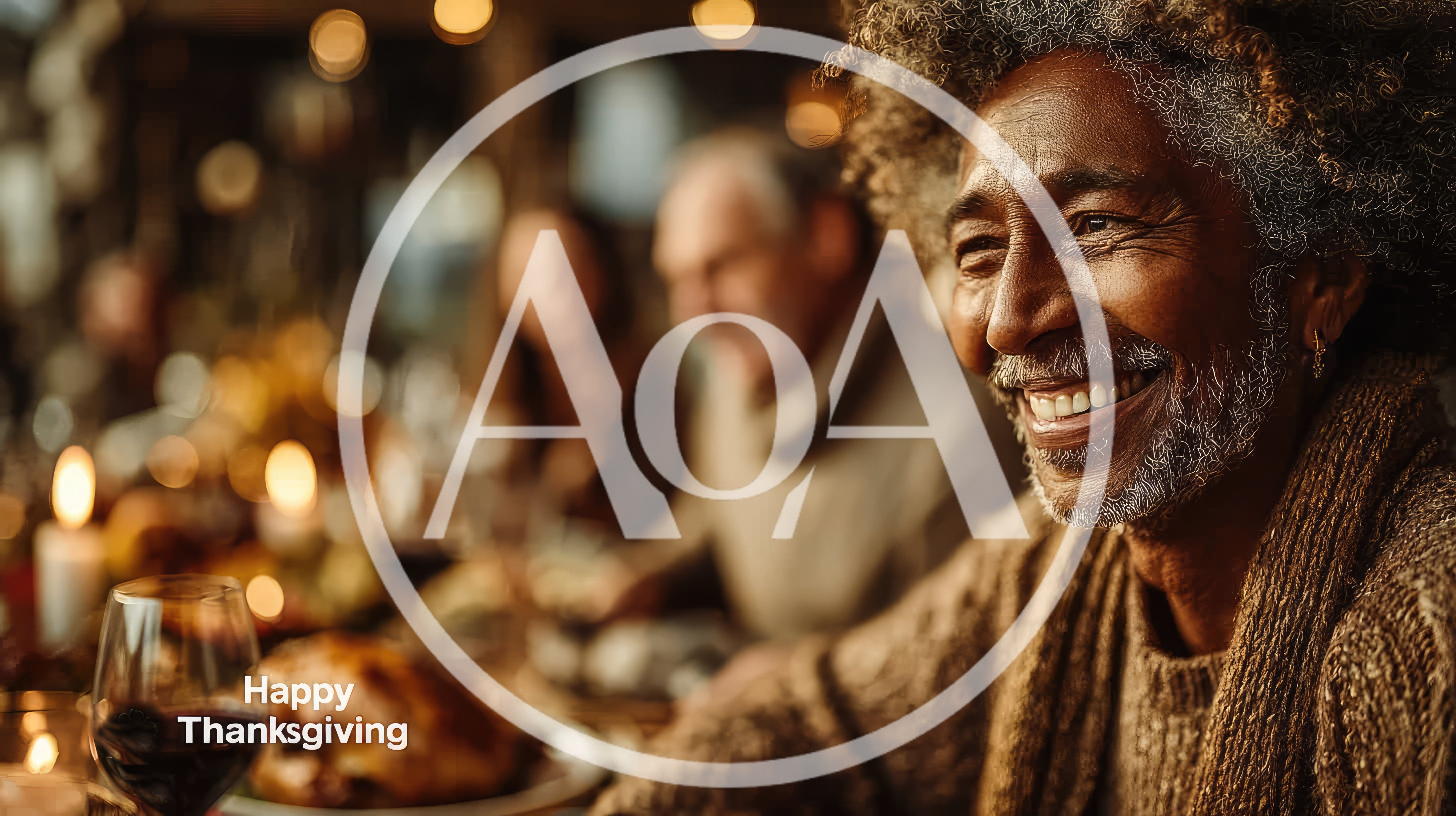 Senior Man Smiling at Thanksgiving Dinner Table