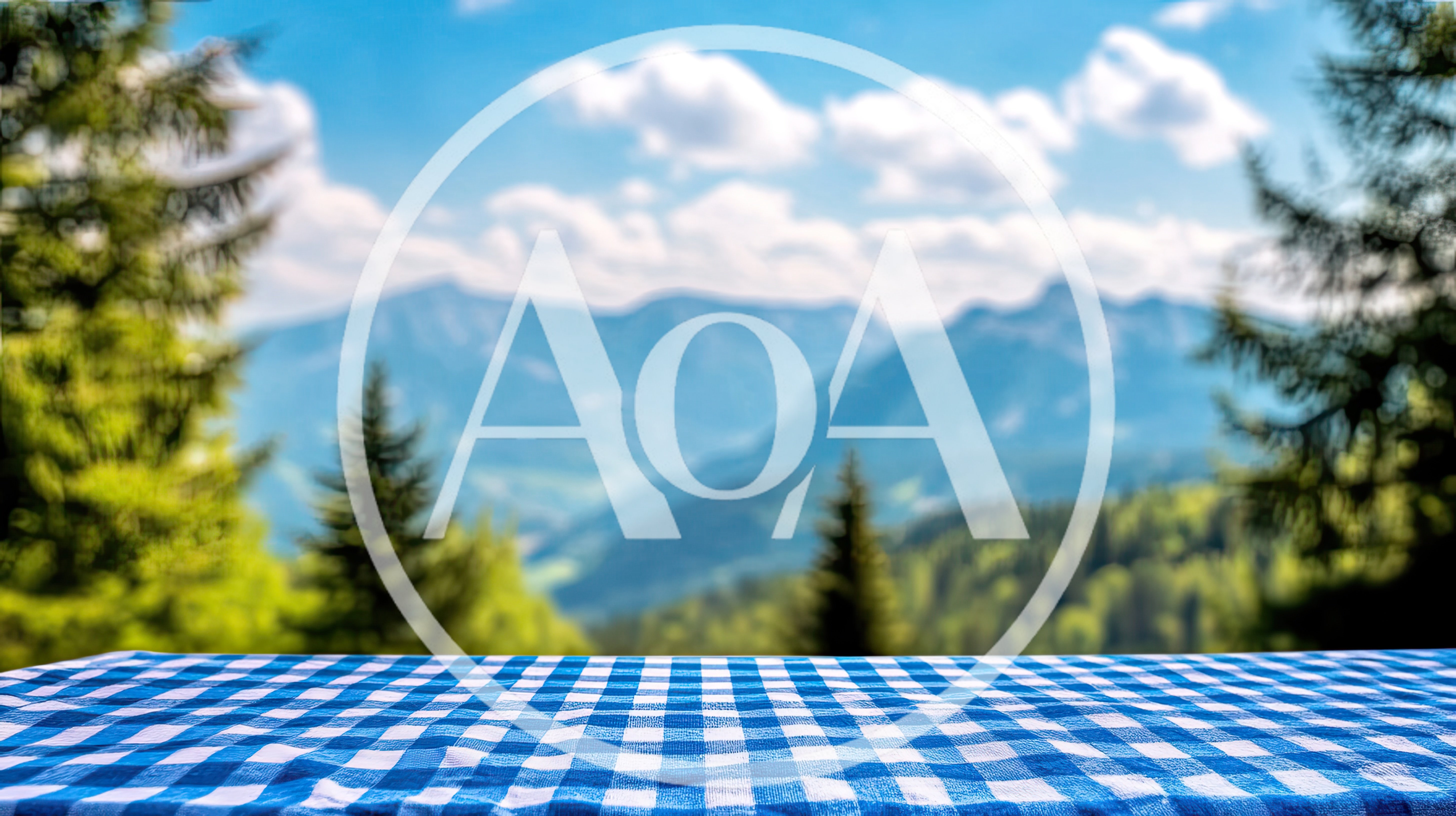 Picnic Table With Blue Gingham Cloth Overlooking Mountains