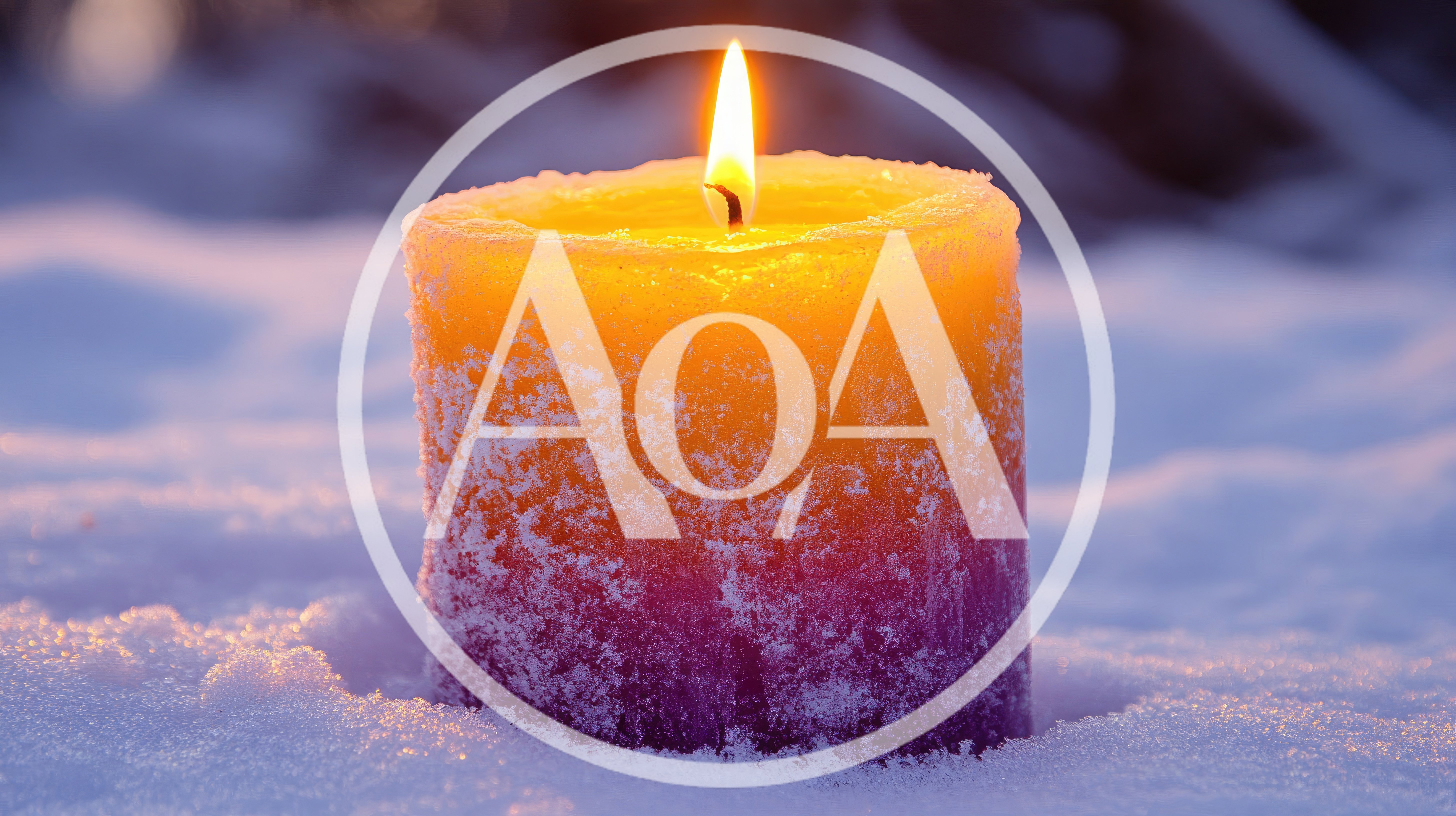 Lit Gradient Candle Resting In Fresh Snow