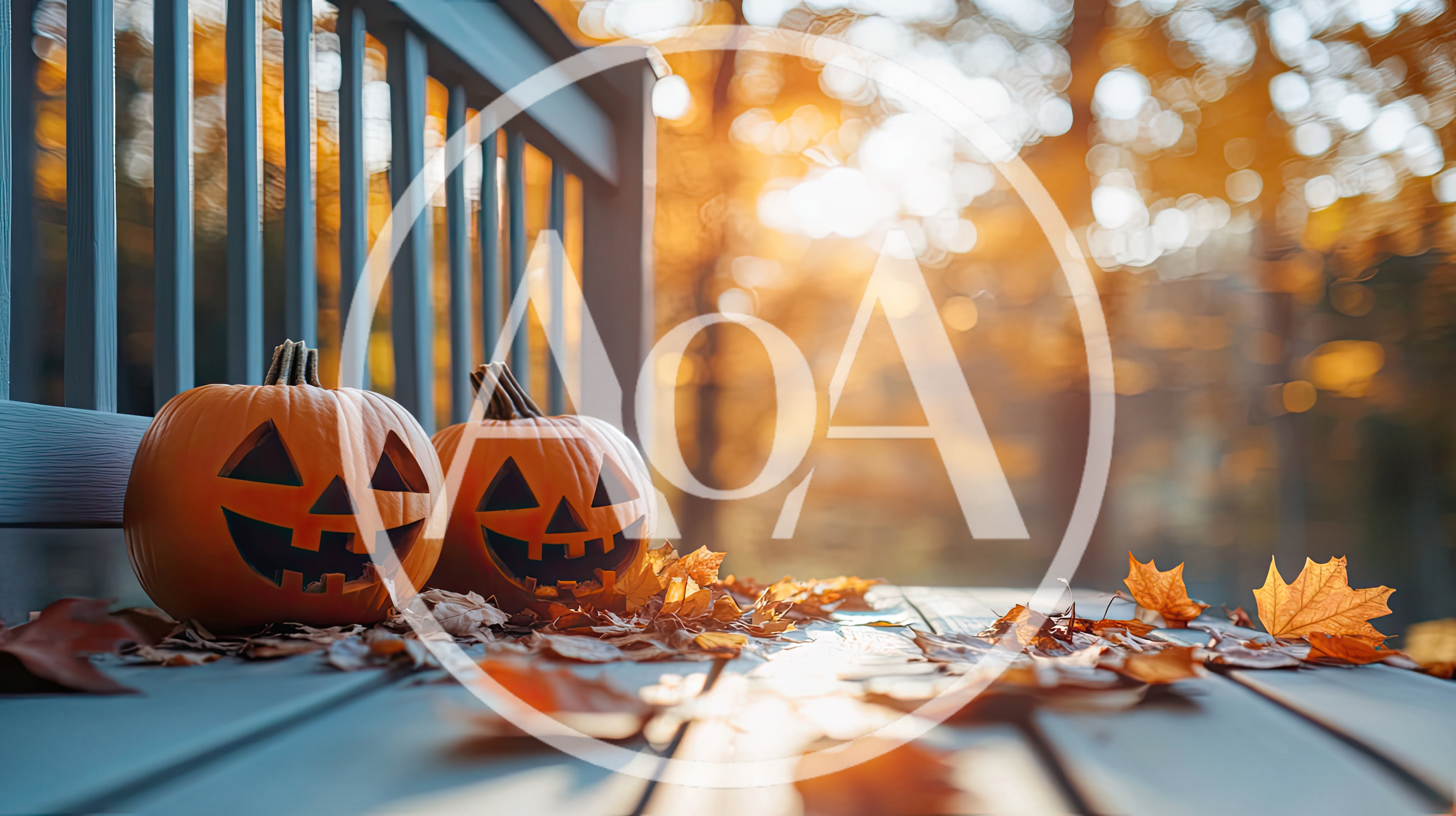 Two Jack-O-Lanterns On A Porch With Autumn Leaves