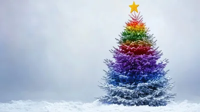 Rainbow Colored Christmas Tree With Gold Star Topper