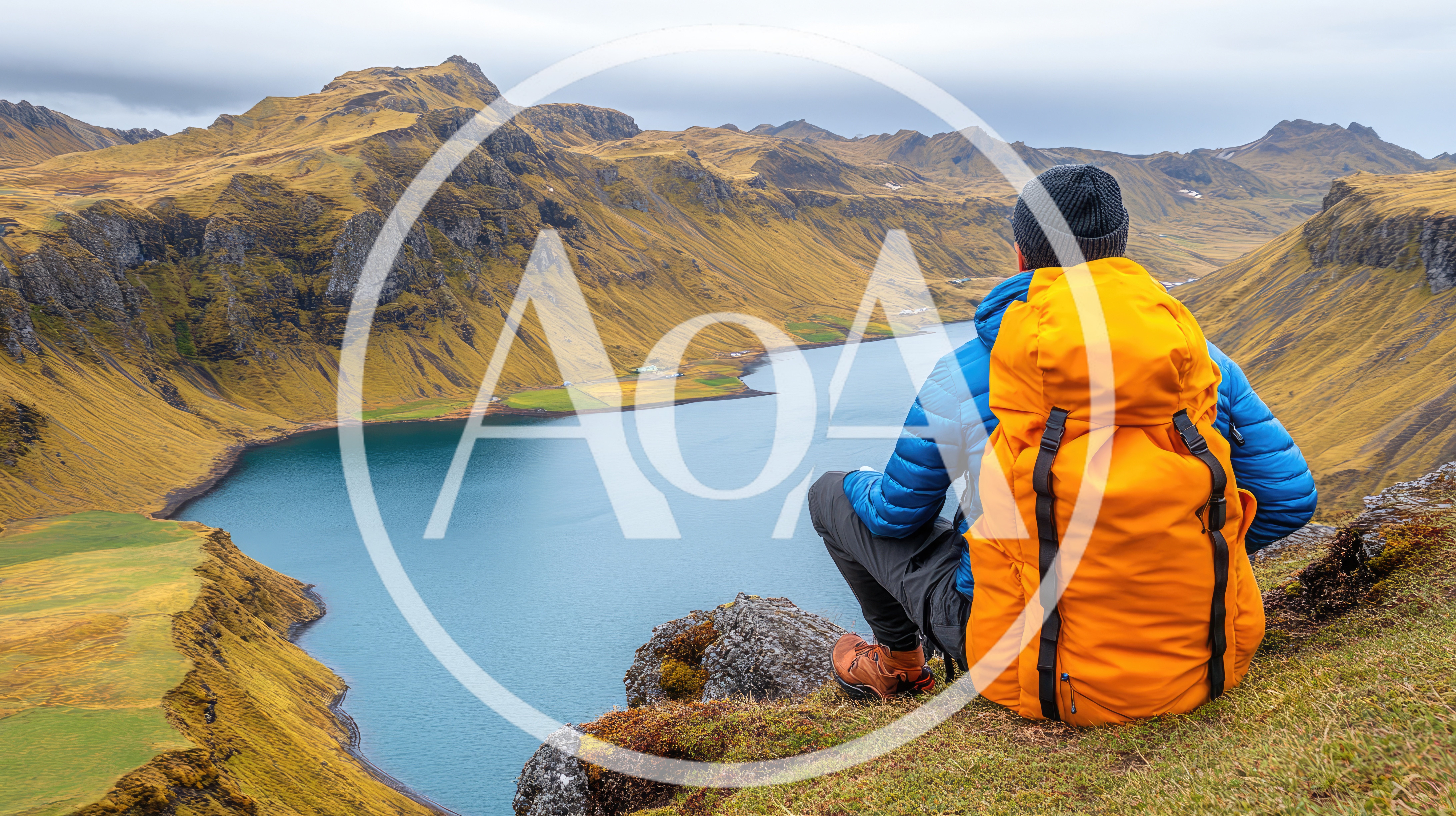 Hiker With Orange Backpack Overlooking Icelandic Lake