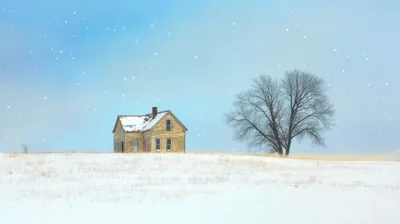 Abandoned Farmhouse In A Snowy Winter Field