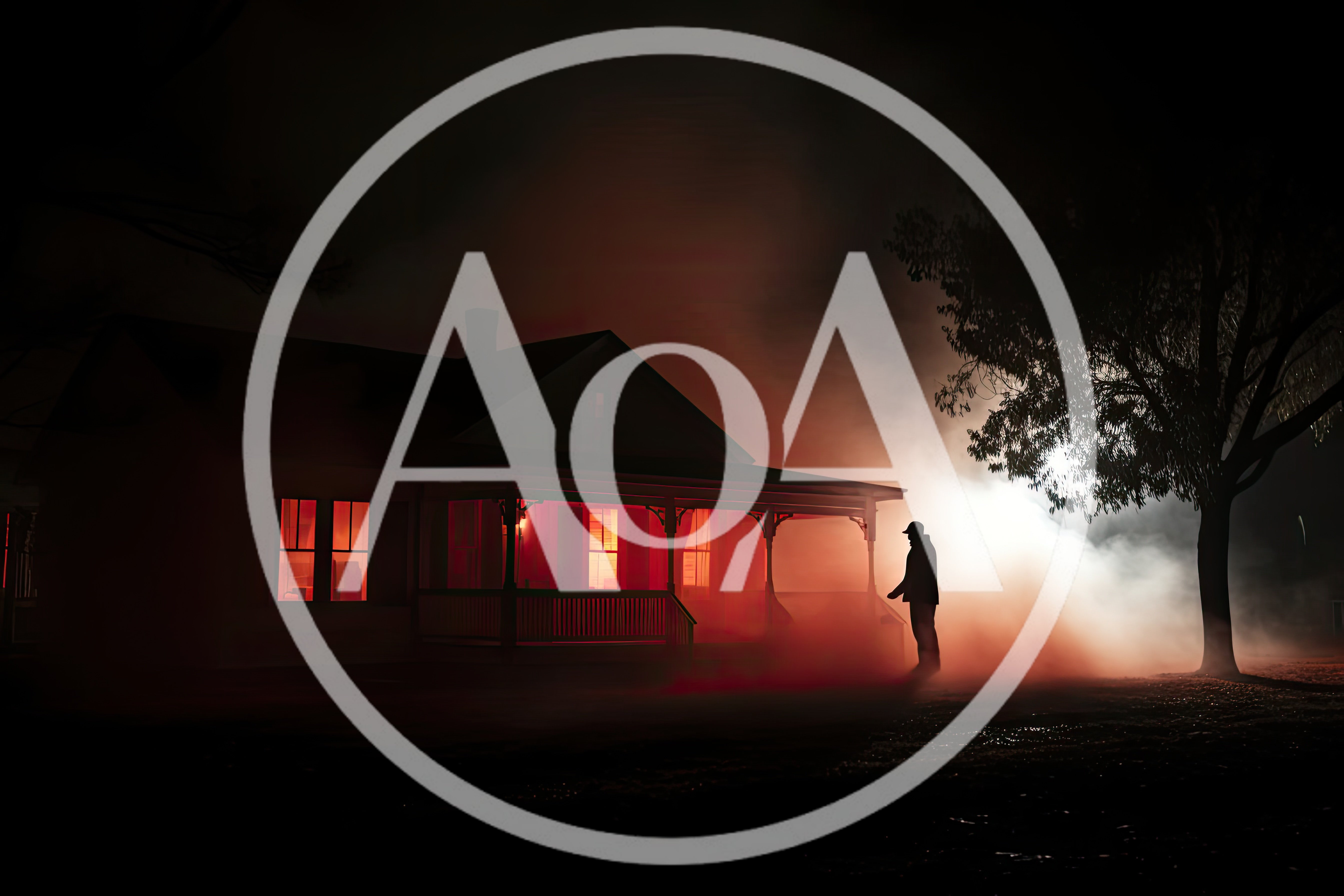 Silhouette Of A Man Standing Before A Haunted House