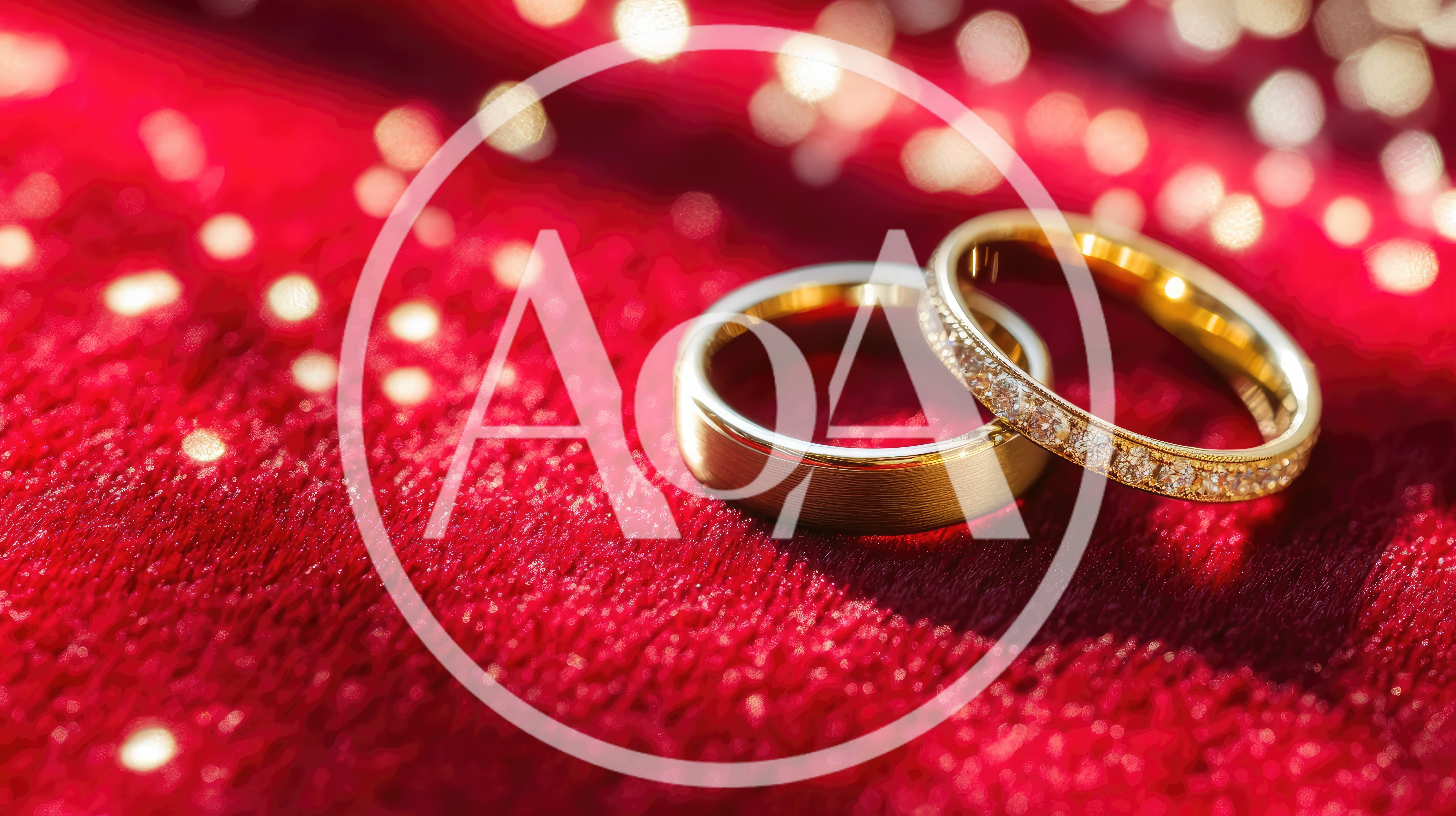 Two Gold Wedding Rings on Red Velvet Fabric