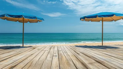 Two Blue Beach Umbrellas On A Wooden Deck