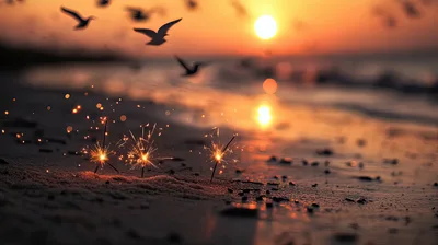 Sparklers Burning on a Sandy Beach at Sunset