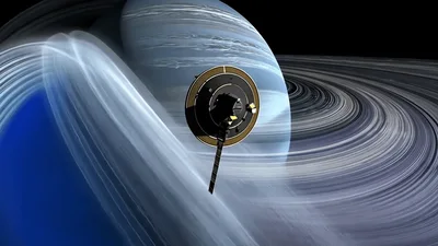 Spacecraft Orbiting A Ringed Gas Giant Planet