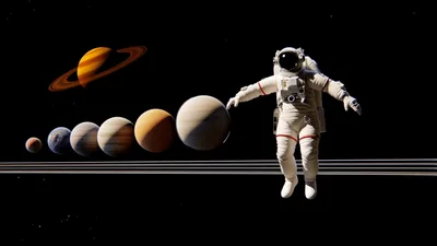 Astronaut Floating Near A Line Of Planets In Space