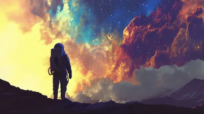 Astronaut Standing On Alien Planet Looking At Colorful Nebula