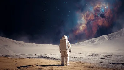 Astronaut Standing Alone On A Desolate Alien Planet Surface