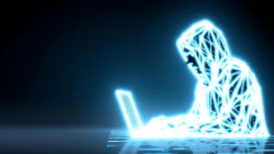 Digital Hacker Silhouette Working On Laptop Computer