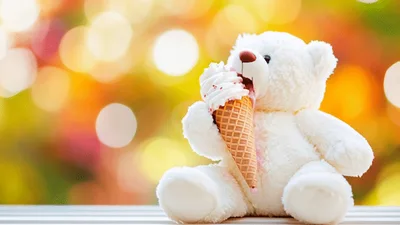 White Teddy Bear Eating Ice Cream Cone