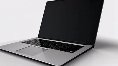 Silver Laptop Computer Rotating On White Background