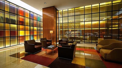 Modern Hotel Lobby Lounge With Colorful Glass Wall
