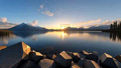 Sunset Over A Calm Mountain Lake Landscape