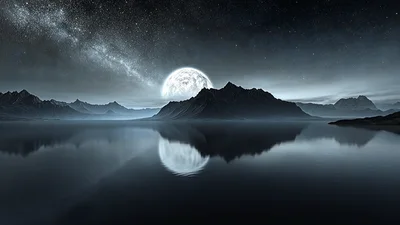 Full Moon Over Dark Mountain Lake At Night