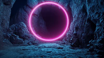 Glowing Pink Neon Ring Portal Inside Dark Rocky Cave