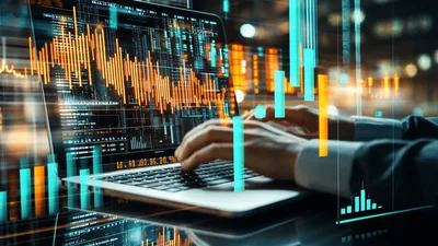 Financial Analyst Working On Laptop With Digital Market Data