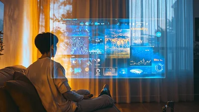 Young Man Interacting With Futuristic Holographic Data Interface