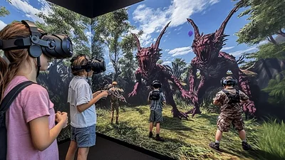 Children Playing Immersive Virtual Reality Monster Combat Game
