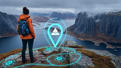 Hiker Standing On Mountain Peak With Augmented Reality Interface