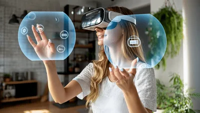 Woman Using Virtual Reality Headset With Holographic Interface