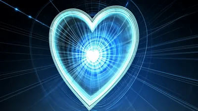 Glowing Blue Digital Heart Pulsing With Light Rays