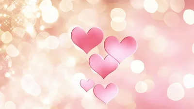 Pink Hearts Floating Across A Soft Bokeh Background