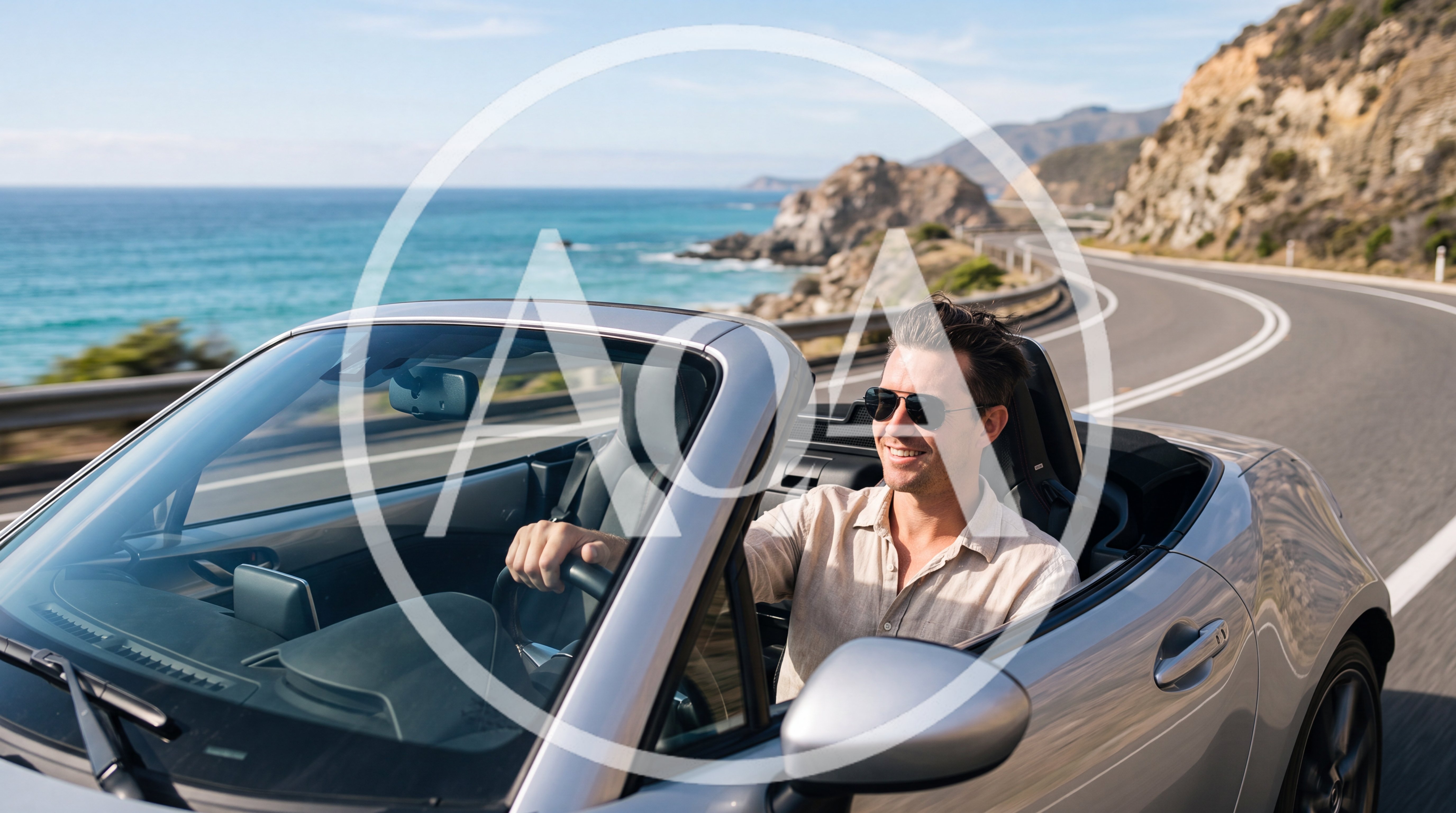 Man Driving Convertible Along Coastal Highway