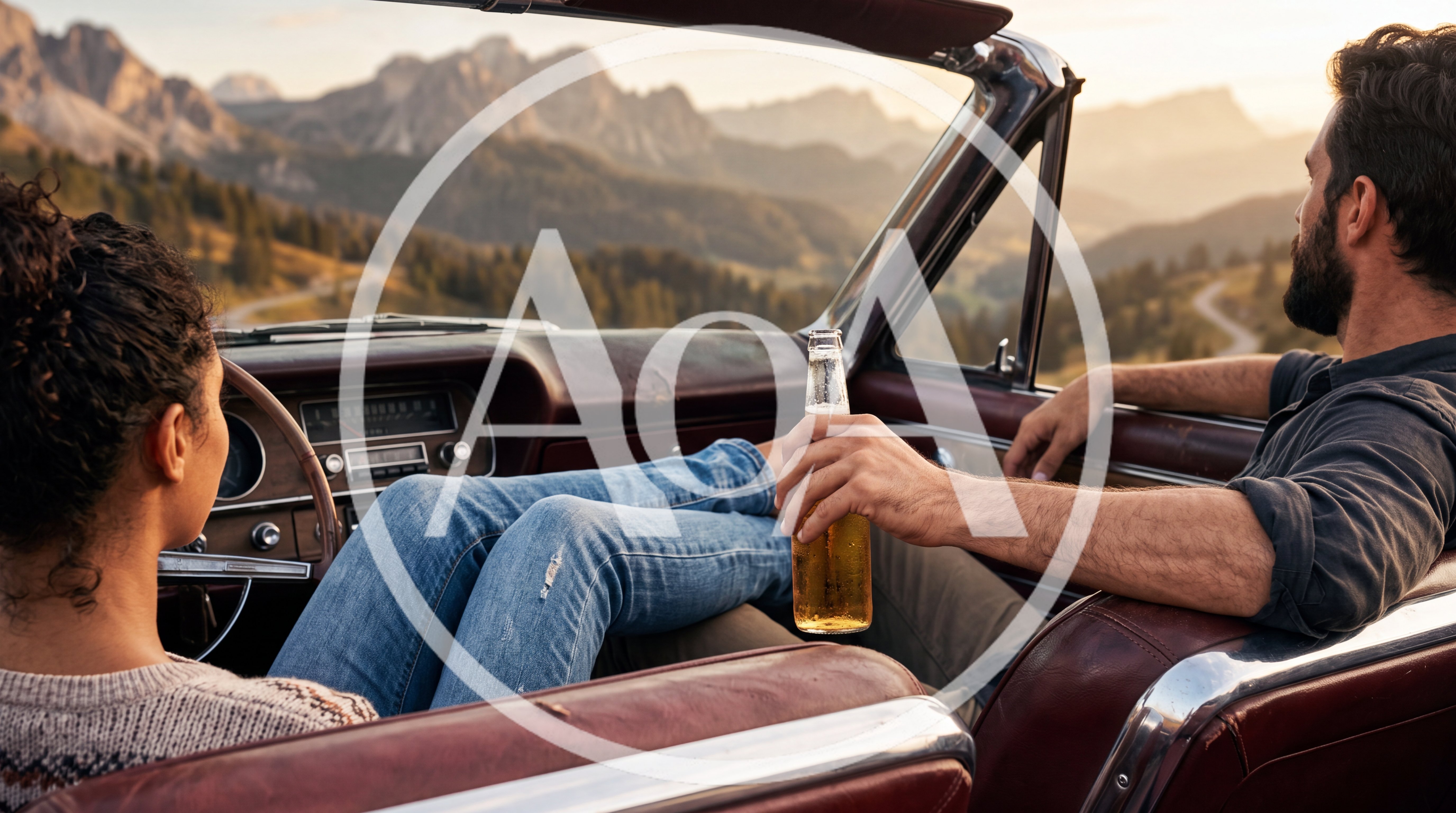 Couple Relaxing In Vintage Convertible With Beer