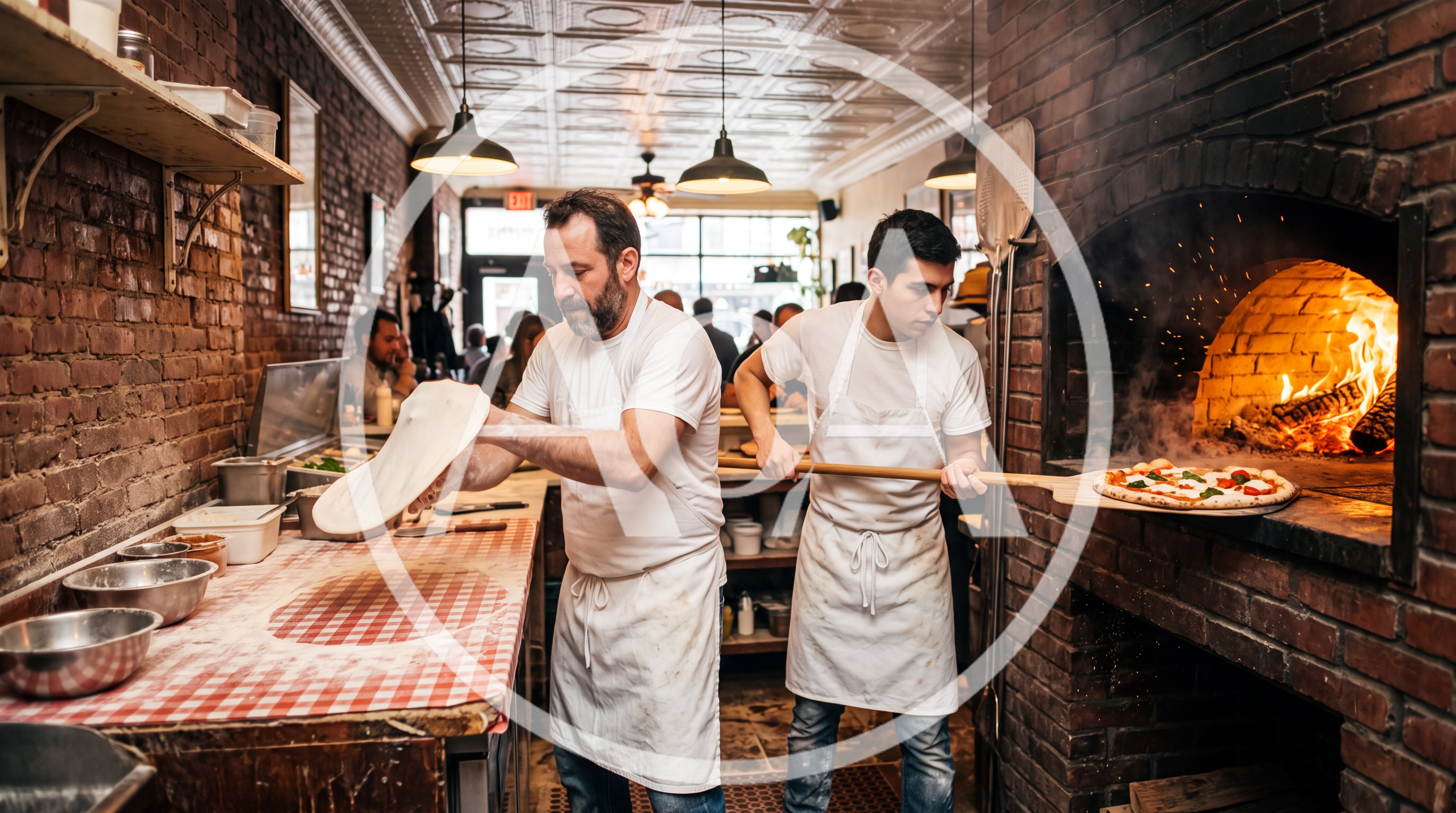 Professional Pizza Chefs Preparing Fresh Pies In Restaurant Kitchen
