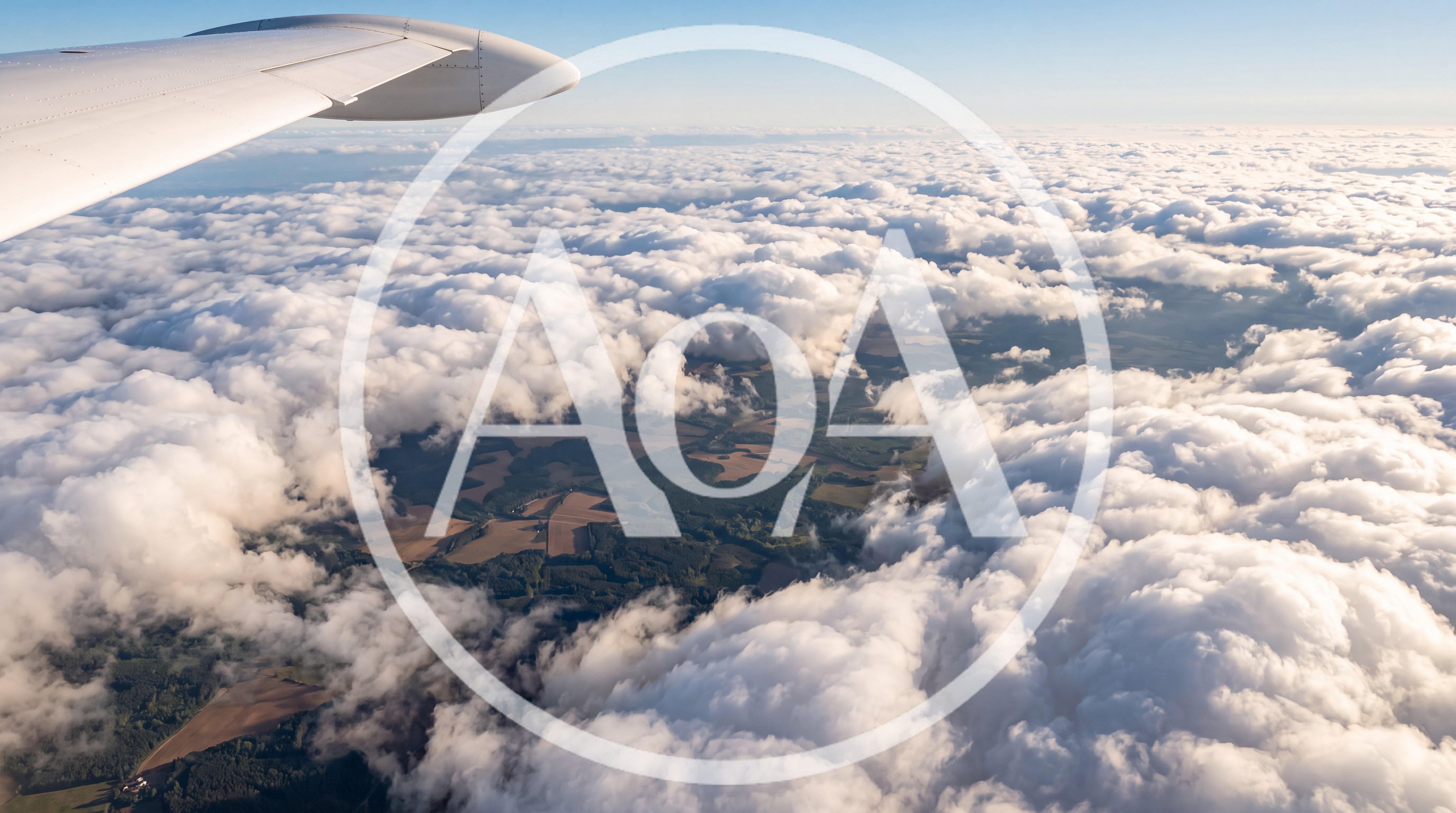 Aerial View From Airplane Window Over Clouds